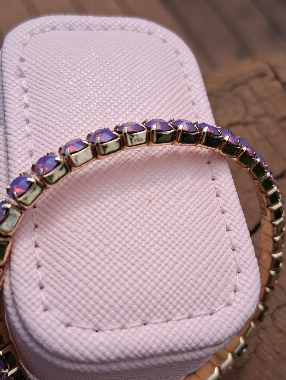 Classic Tennis Bracelet Style On Stretchy Band In Pink Lavender Hues.